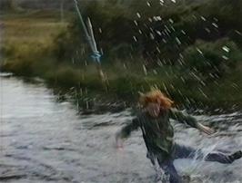 Jon Burgess tries again - but slips off the rope at the far point of his swing!  His wallet got every so slightly wet!